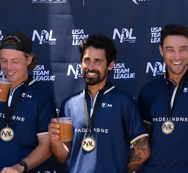 Padel N9NE players celebrating together